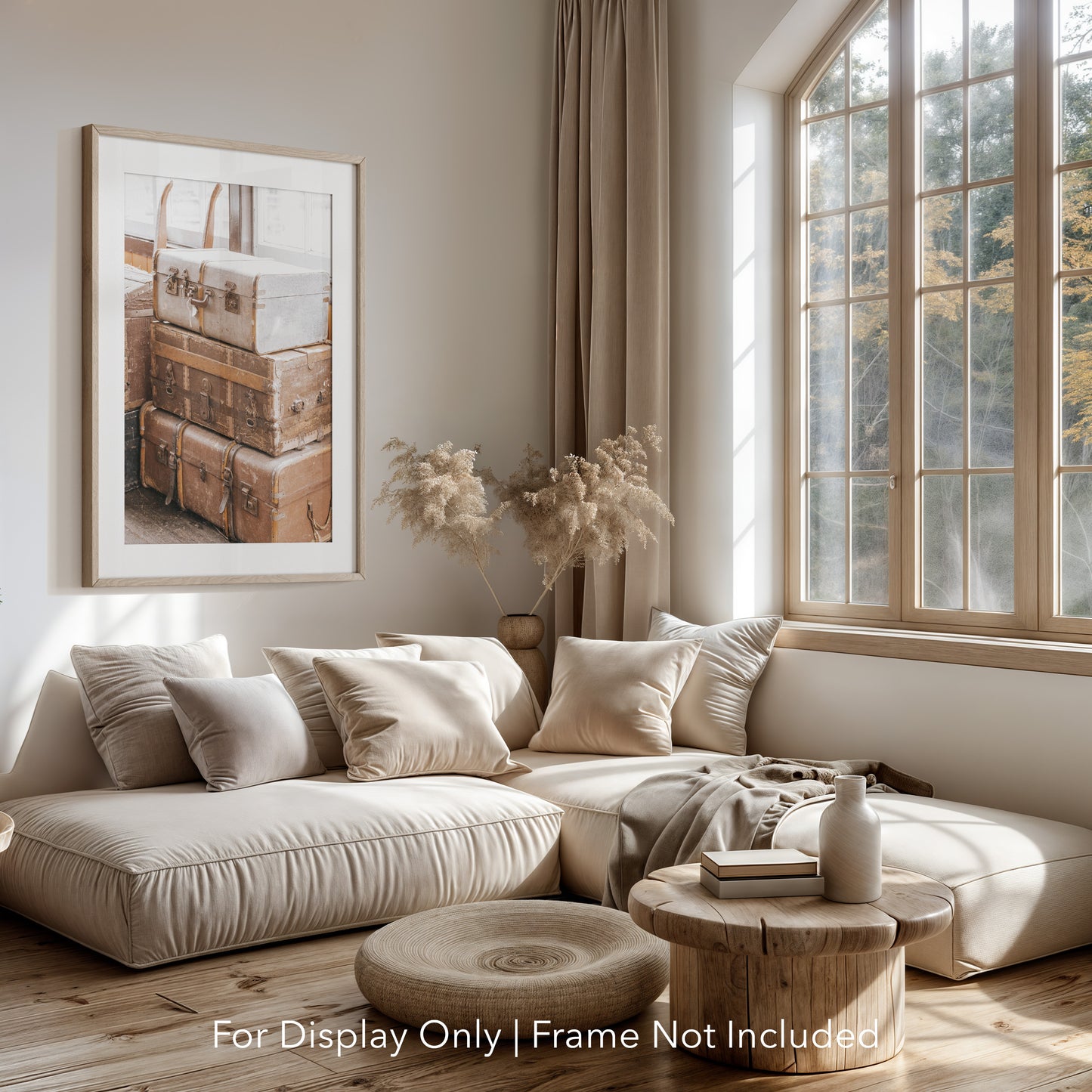 Stack of vintage suitcases and trunks with worn leather and metal details, photographed in soft natural light for a warm, rustic aesthetic.