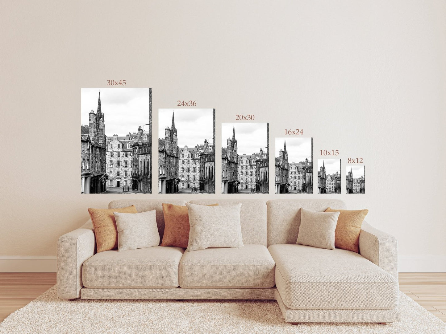 Black and white photograph of an Edinburgh street with historic stone architecture and a church spire.