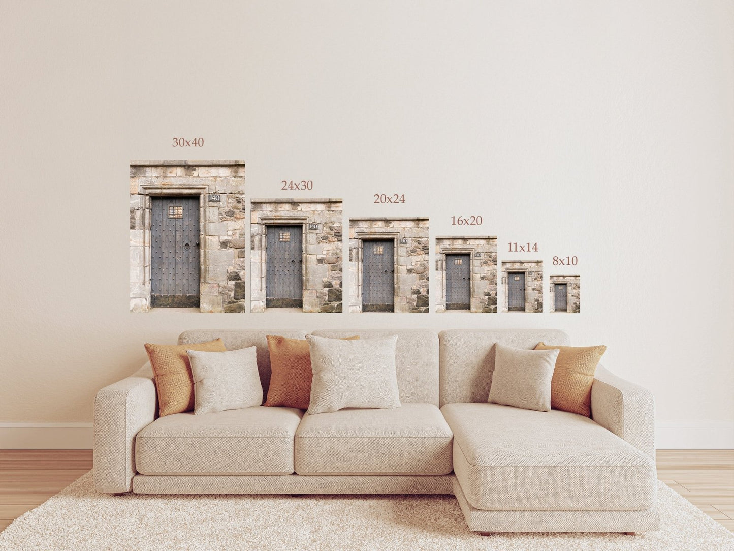 Rustic wooden door with iron studs set in a weathered stone wall, photographed in Edinburgh, Scotland.