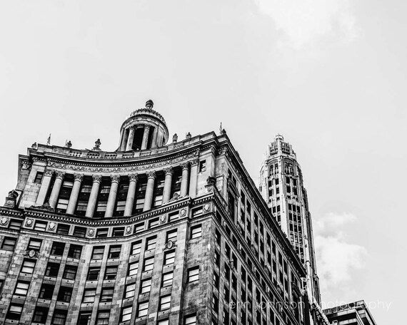 Black and white photograph of a historic building on Wacker Avenue in Chicago, showcasing details of its architecture.