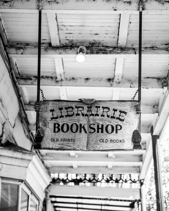 Black and white photograph of the Librairie Bookshop in New Orleans by Erin Johnson, available as print or canvas, ideal for living rooms, offices, or hallways