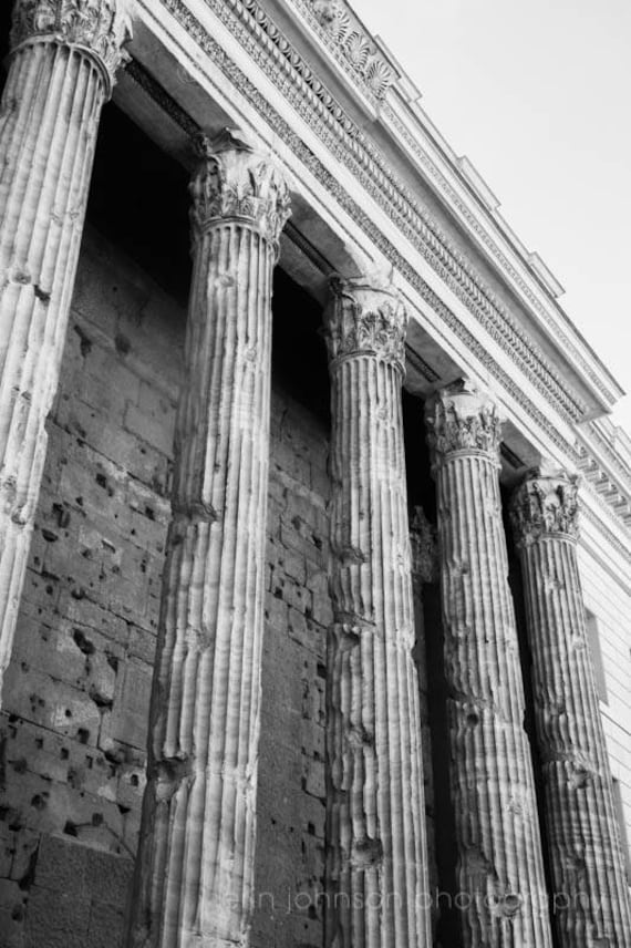 Black and white photograph of Roman columns in Rome, Italy, perfect for travel-inspired wall art and home décor.
