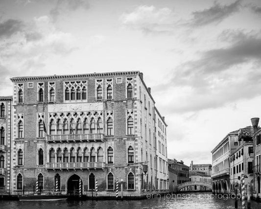 a black and white photo of a building in venice
