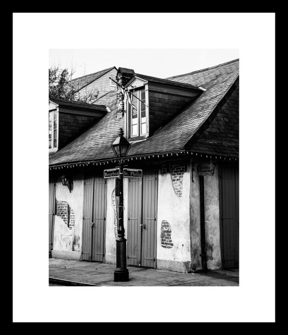 Black-and-white photograph of Jean Lafitte's Blacksmith Bar in New Orleans, Lousiana.