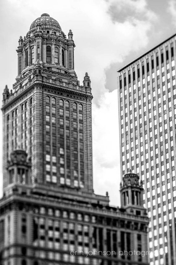 Black and white photograph of the Jeweler’s Building, featuring neoclassical architecture, with a modern skyscraper in the background in Chicago.
