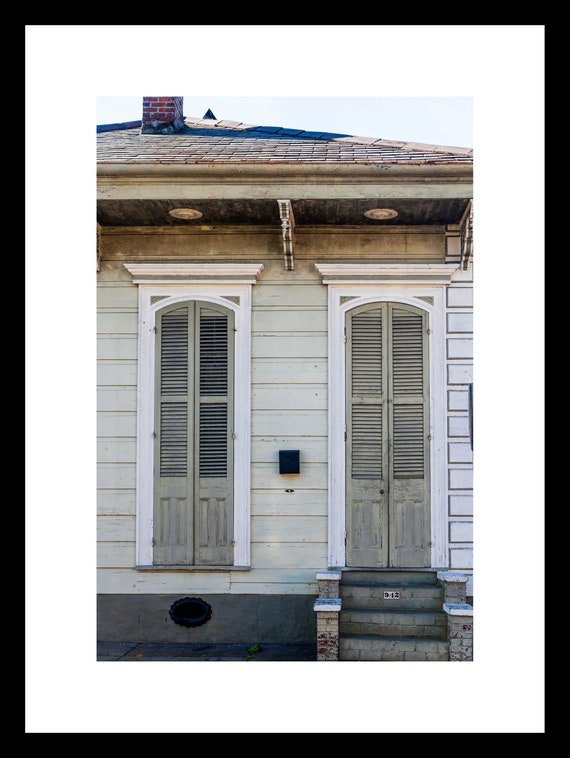 Photograph of the Green Creole Cottage in New Orleans by Erin Johnson, available as print or canvas, ideal for living rooms, offices, or hallways