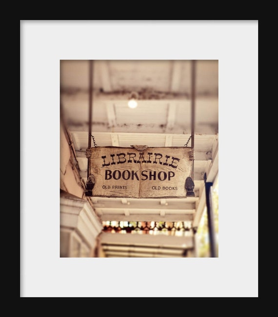 Vintage Librairie bookshop sign on Chartres Street in New Orleans, perfect wall art for book lovers and French Quarter décor.