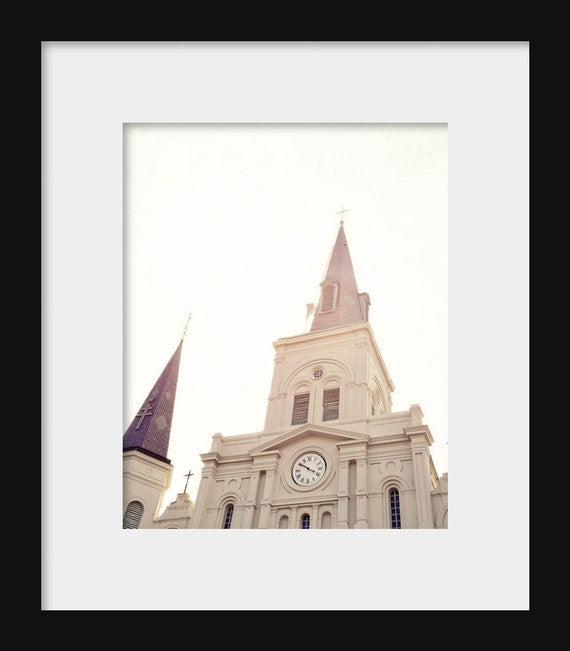 St. Louis Cathedral in Jackson Square, New Orleans, white architectural photography capturing the elegance of the French Quarter, perfect for Louisiana-inspired home décor.