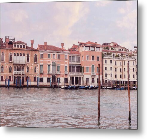 A metal print depicting a view of Venice Italy, showing the Grand Canal with buildings on either side and gondolas moored along the bank.