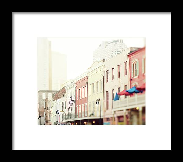 a picture of a city street with buildings in the background