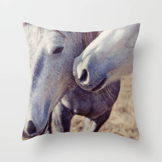 Rustic farmhouse pillow cover featuring a black and white photograph of two horses touching noses, printed on soft velveteen fabric with a hidden zipper closure.