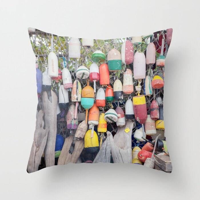 a pillow that has a bunch of buoys on it