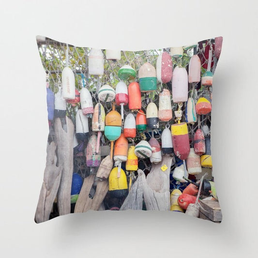a pillow that has a bunch of buoys on it