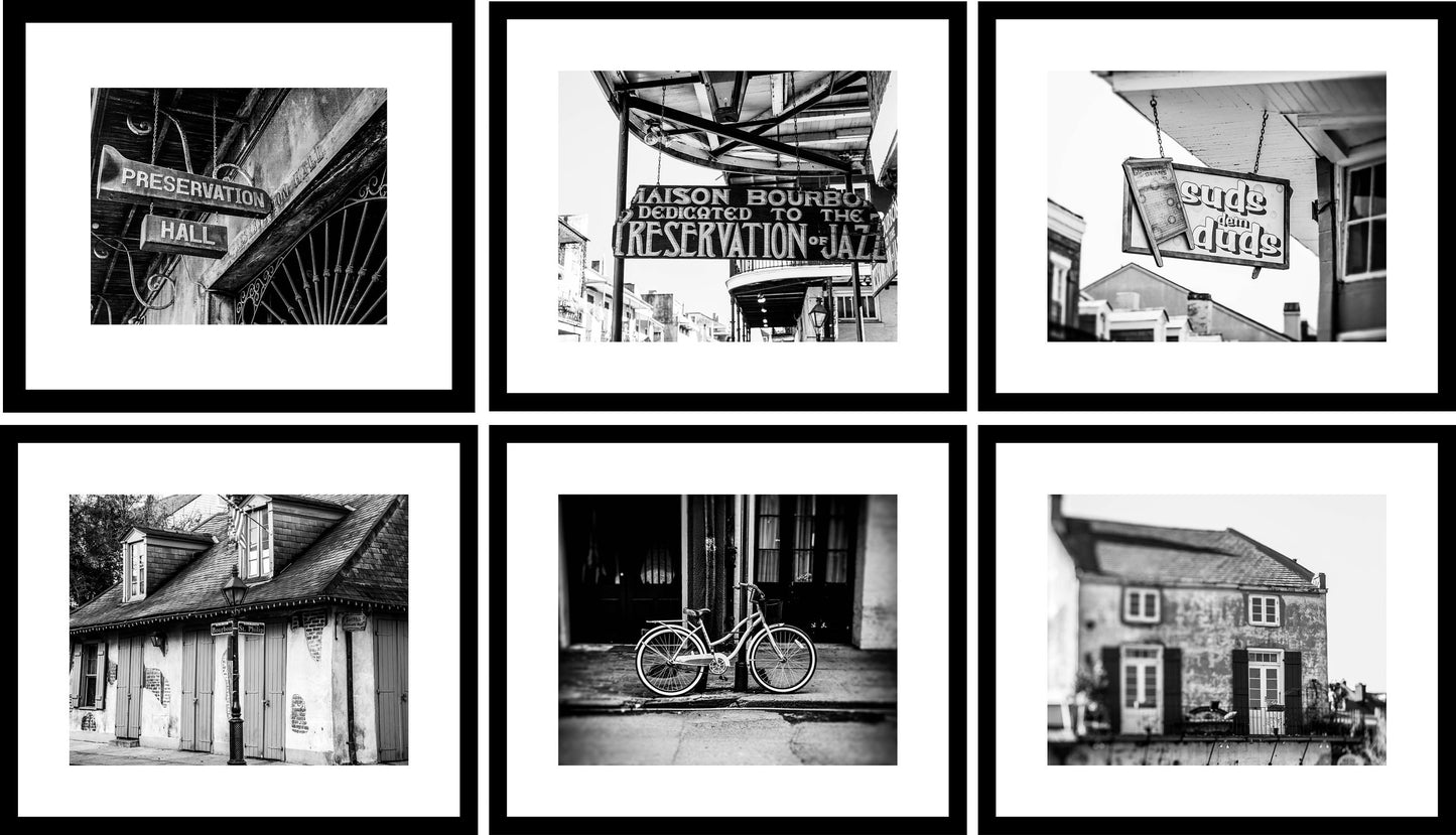 A collection of six black and white photographs of New Orleans, featuring iconic imagery such as a bicycle, vintage signs, and other cityscape elements.
