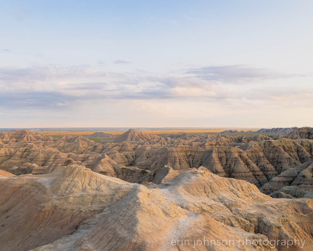 a view of the badlands from the top of a hill
