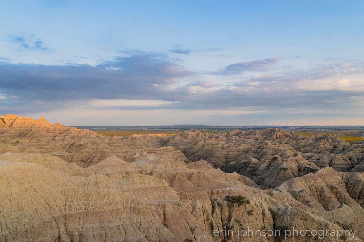 a view of the badlands from the top of a hill