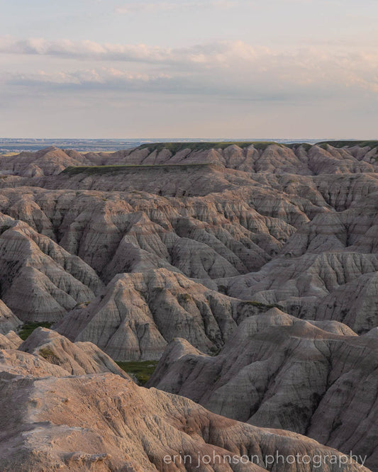 Landscape photograph of the Badlands in South Dakota with rugged rock formations