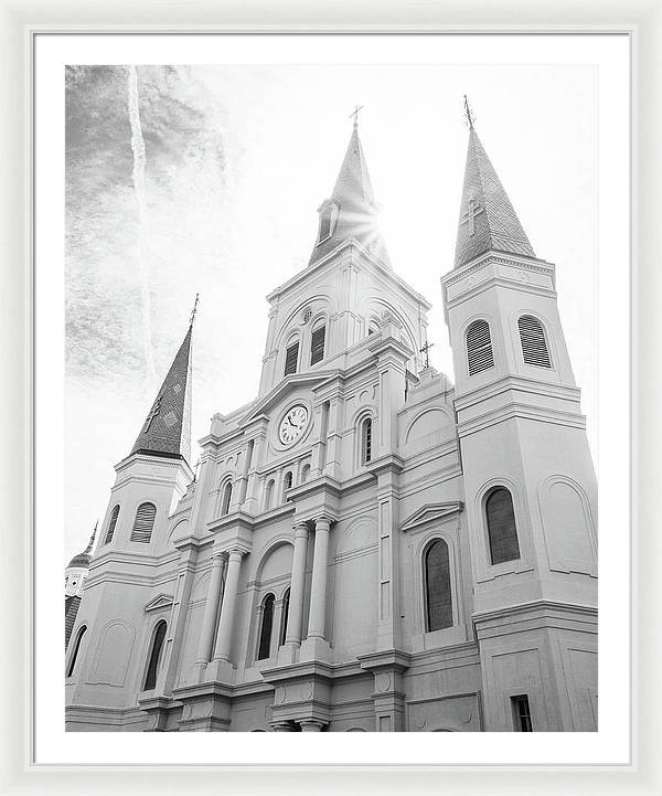 A framed black and white image of the St. Louis Cathedral in New Orleans, with a museum-quality frame.