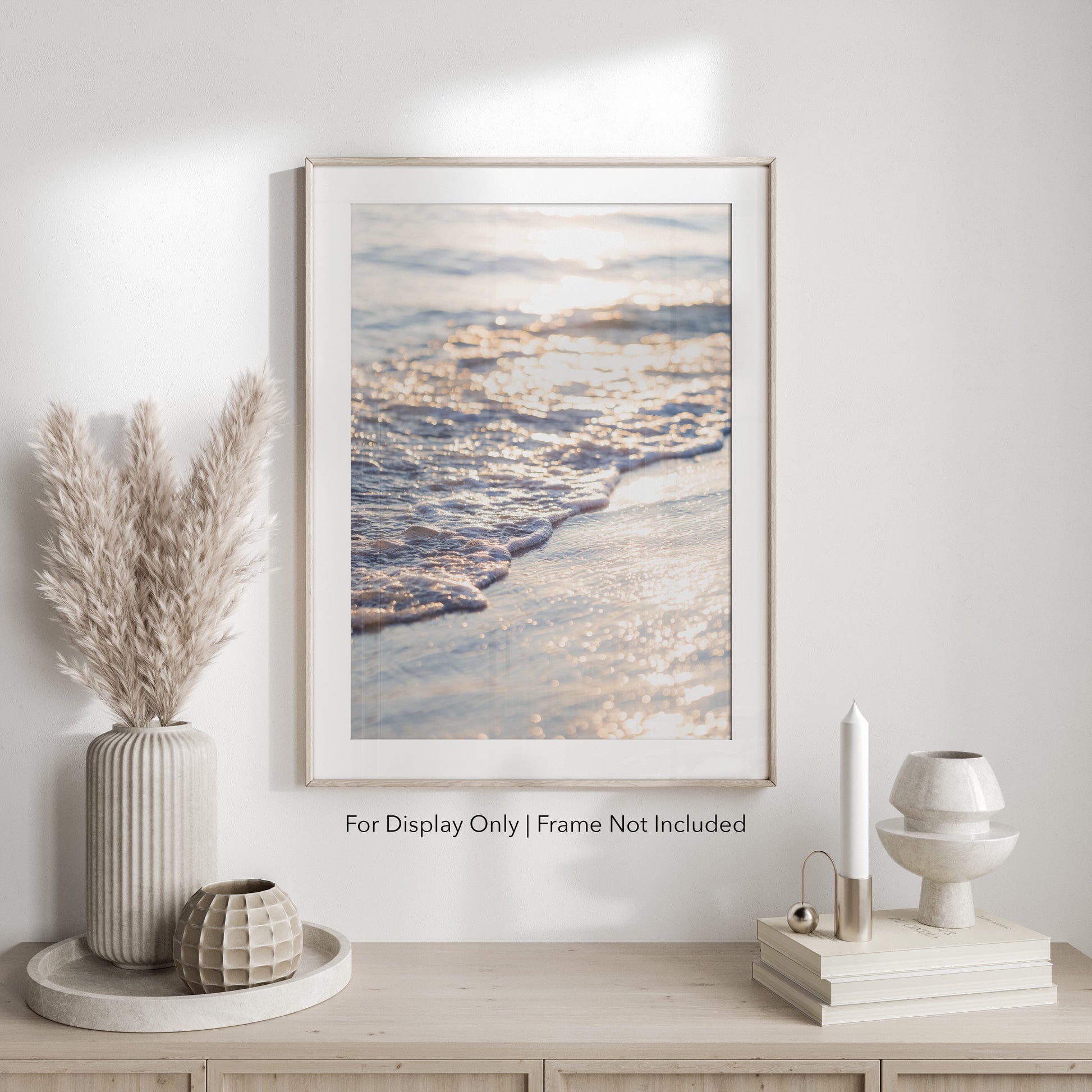 Ocean waves washing ashore in golden sunset light, coastal beach photography wall art.