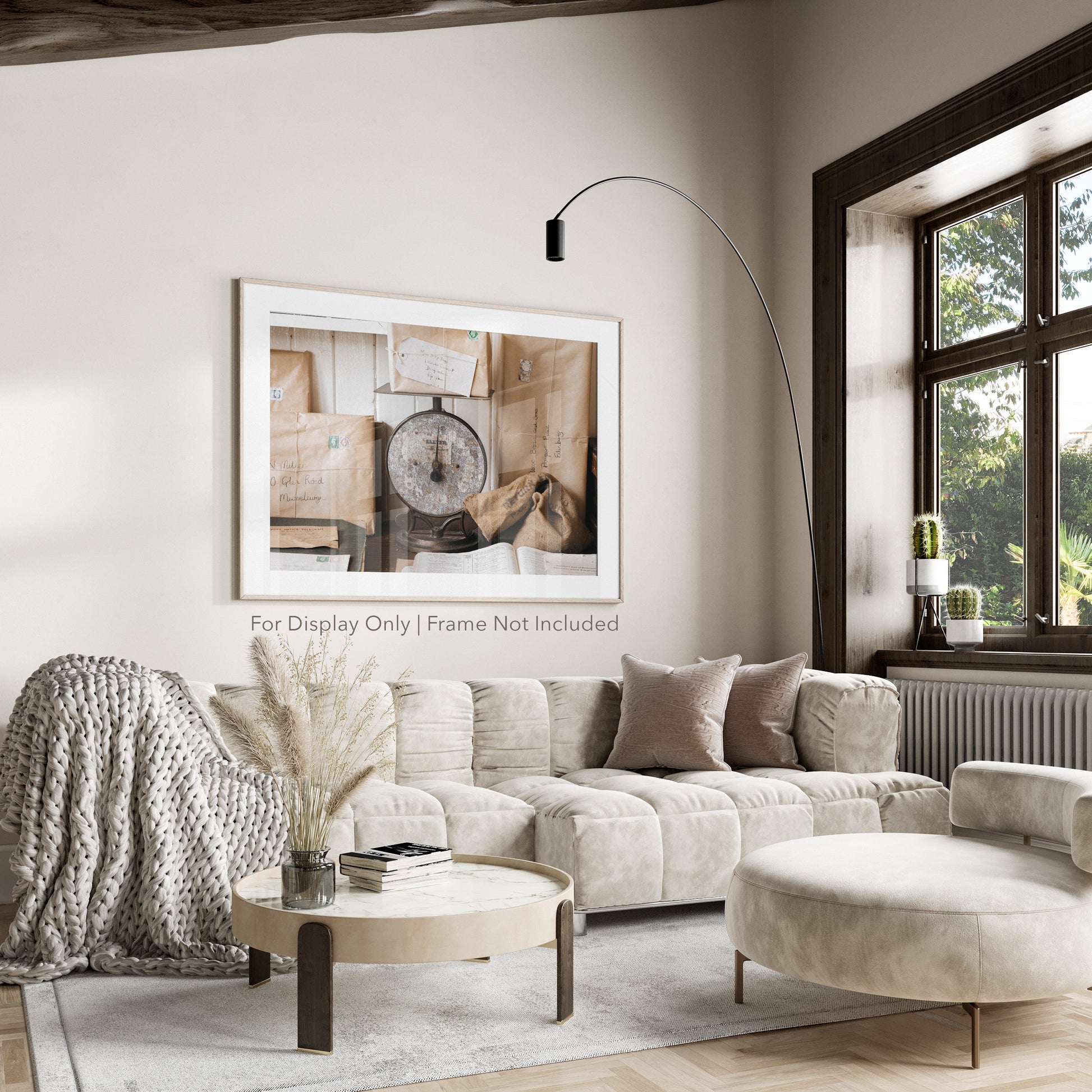 Rustic still life of vintage parcels wrapped in brown paper with stamps, stacked around a weathered post office scale.
