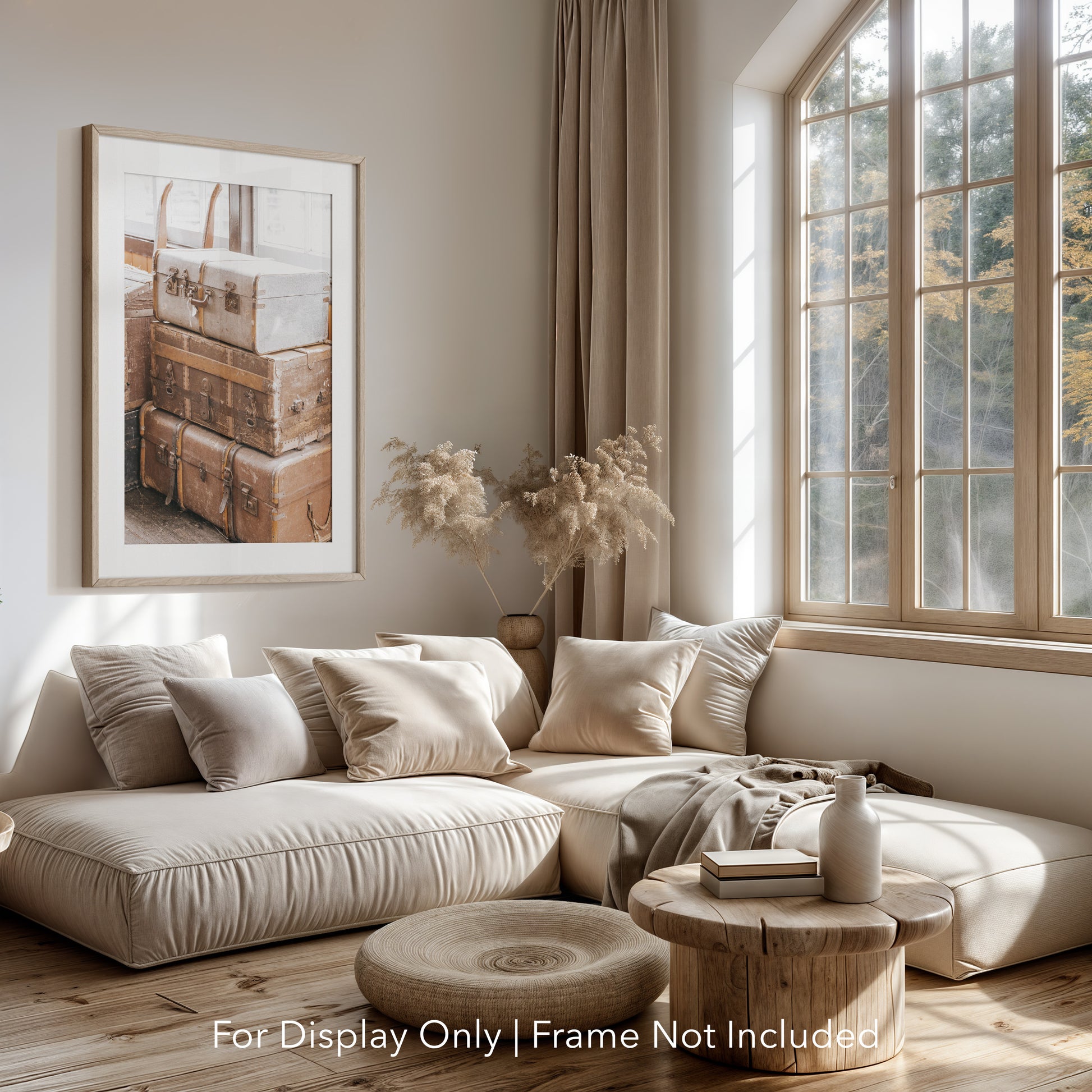 Stack of vintage suitcases and trunks with worn leather and metal details, photographed in soft natural light for a warm, rustic aesthetic.