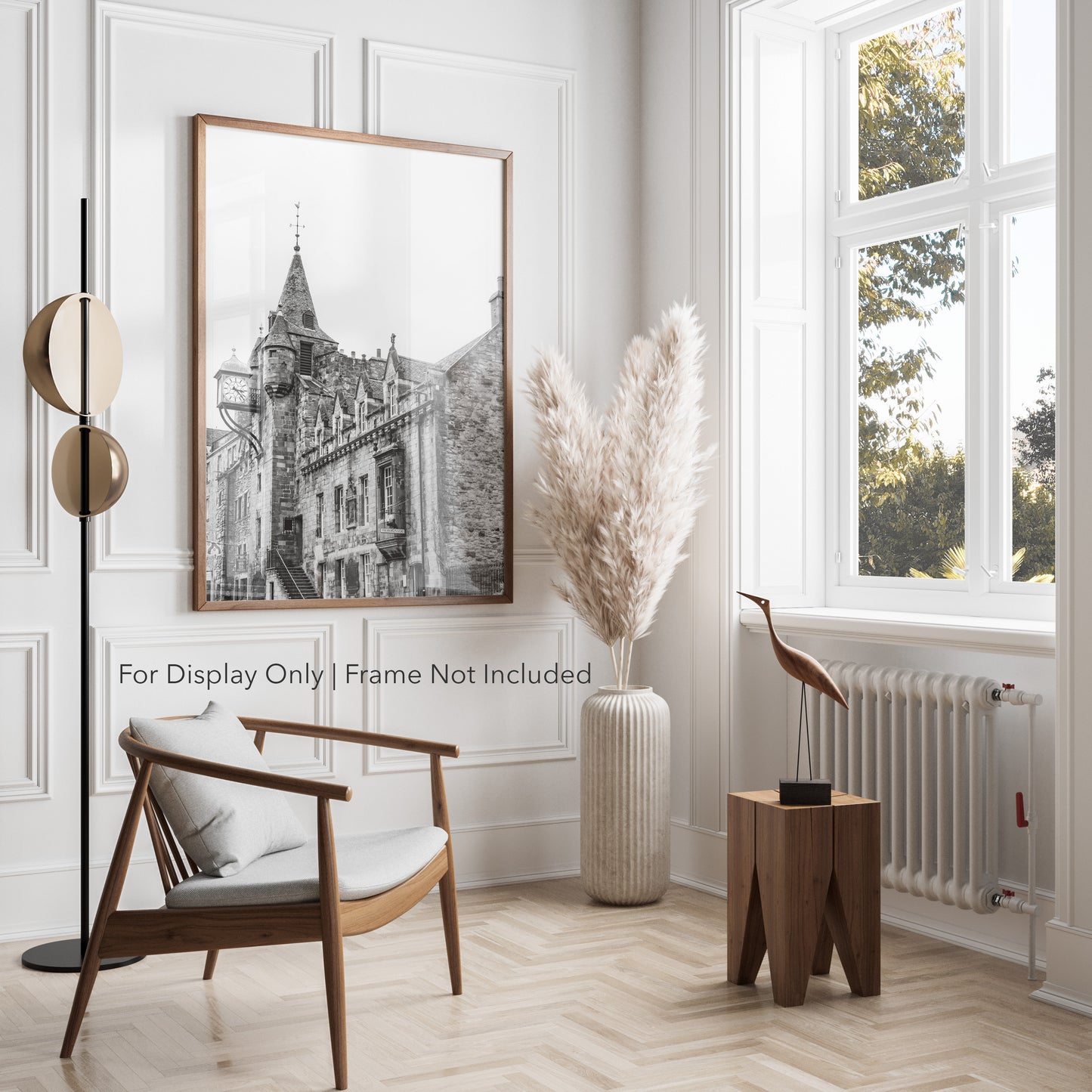 Black and white photograph of the Canongate Tolbooth clock tower on Edinburgh’s Royal Mile, historic stone building with Gothic details.
