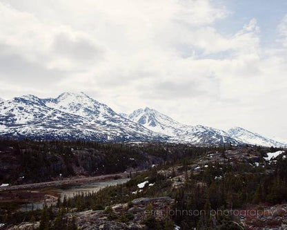 Snow-capped mountains landscape along the Klondike Highway / White Pass between Alaska and Yukon – serene nature photography.