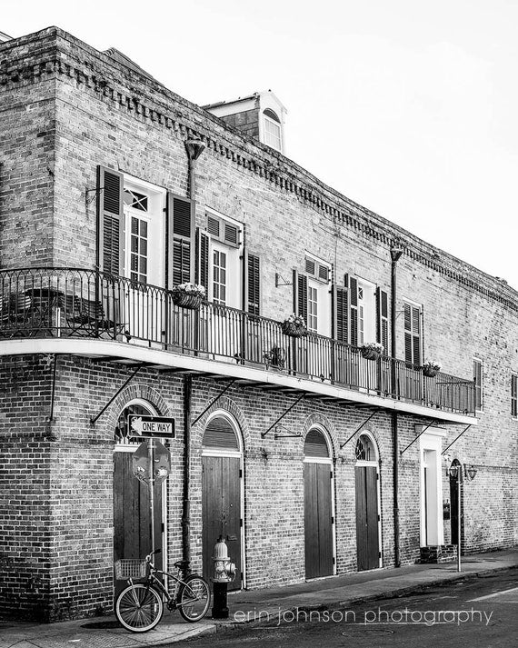 a black and white photo of a brick building