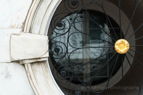 a close up of a door with a circular window