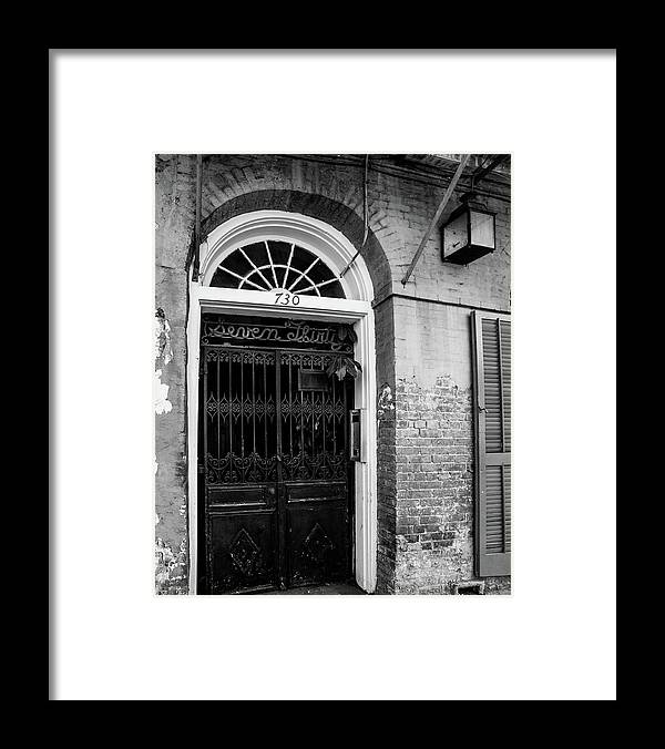 a black and white photo of a doorway