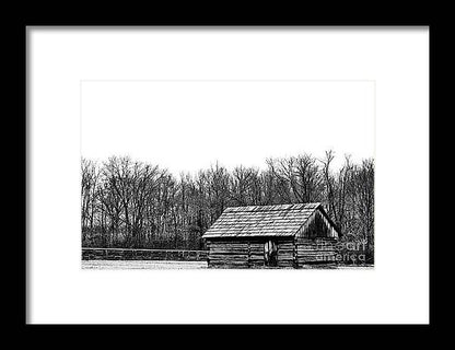 a black and white photo of a barn