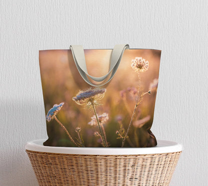 a shopping bag with a picture of a flower on it