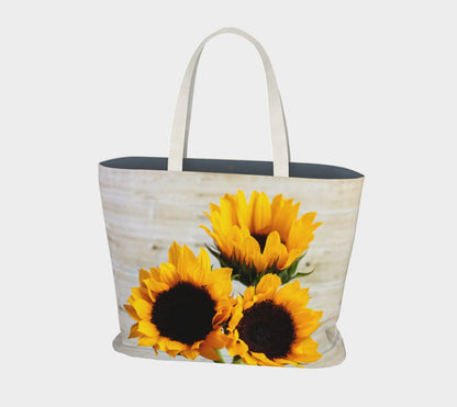 a white bag with sunflowers on it