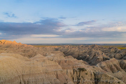 a view of the badlands from the top of a hill