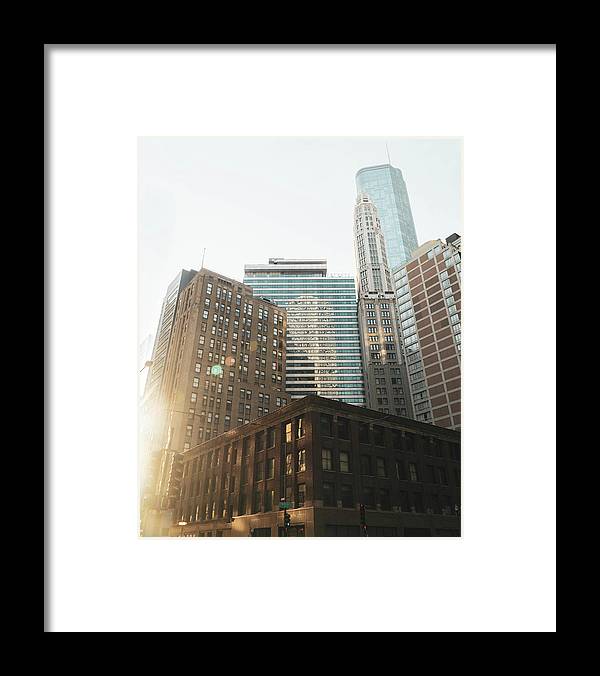 a picture of a city with tall buildings