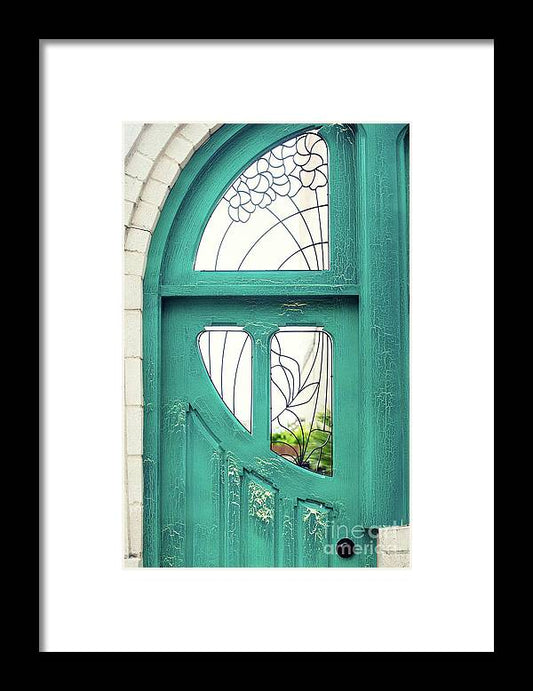 a green door with a stained glass window